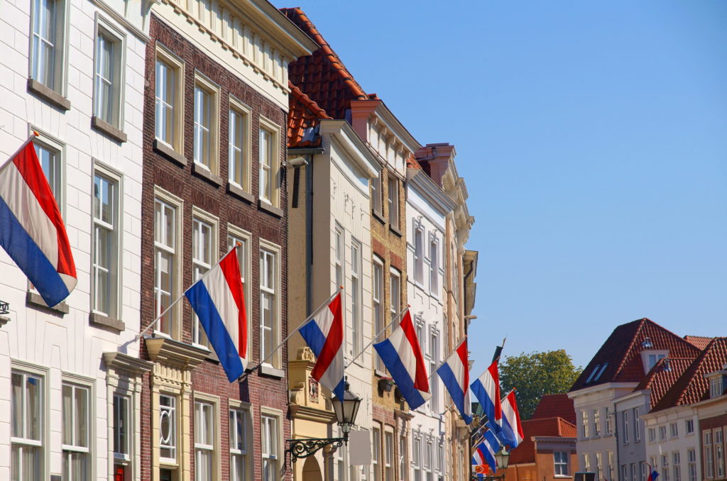 Neighborhood,In,A,Dutch,Village,With,The,Dutch,Flag,On