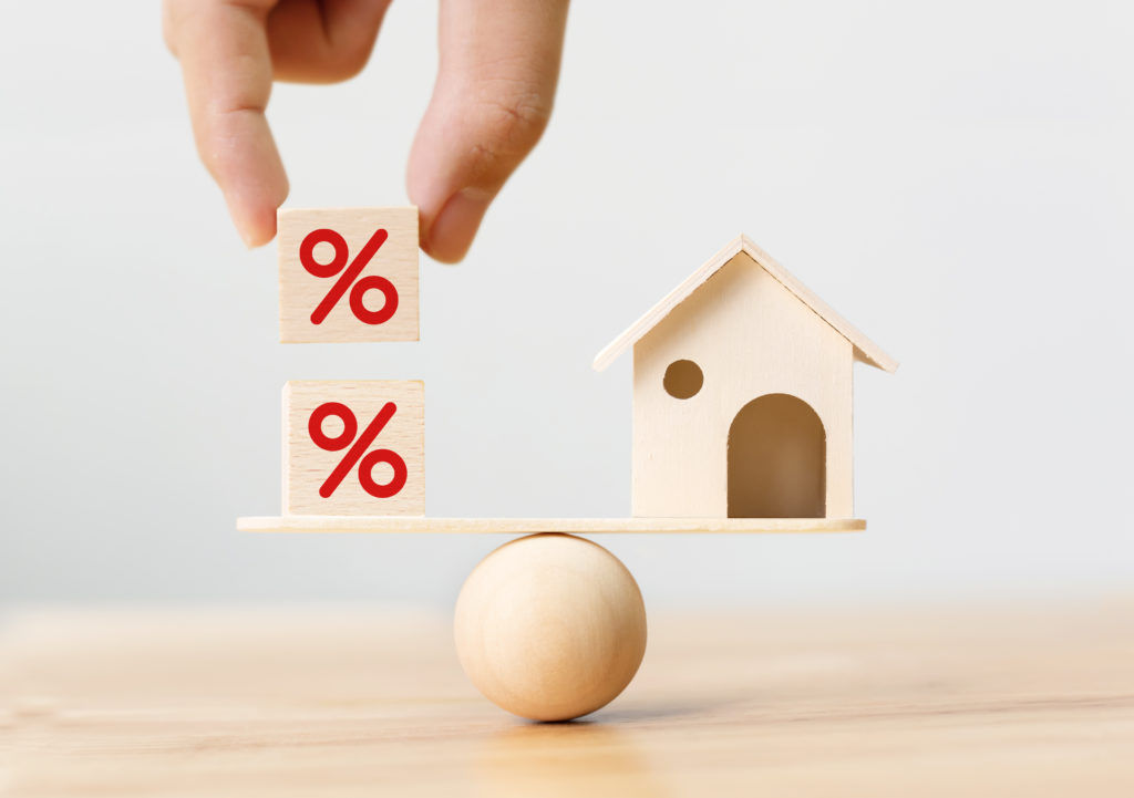 Interest,Rate,Financial,And,Mortgage,Rates,Concept.,Wooden,Home,And