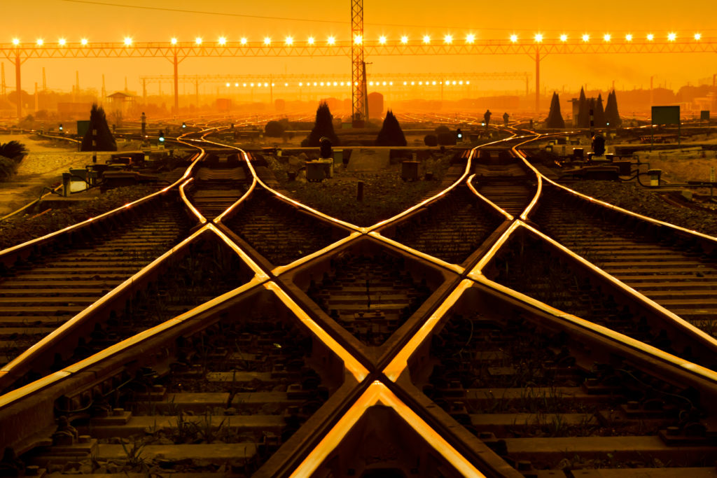 Cargo,Train,Platform,At,Sunset,With,Container