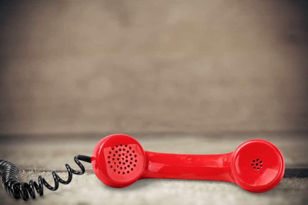 Red,Retro,Telephone,Handset,On,The,Desk