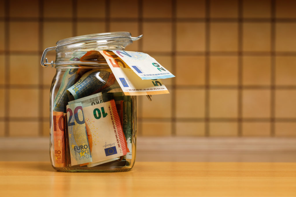 Euro,Banknotes,In,A,Glass,Jar,Close-up,In,The,Kitchen.