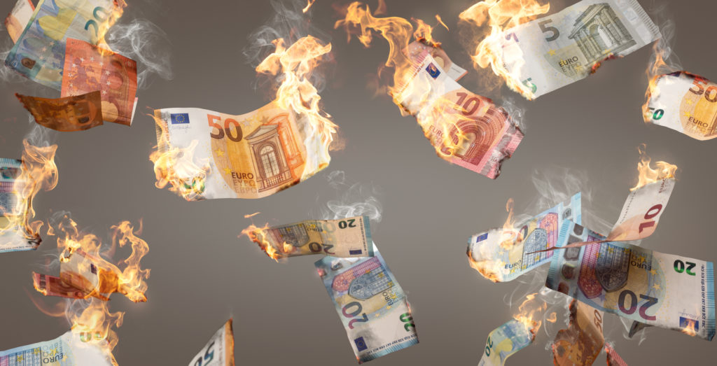 Burning,Euro,Banknotes,Falling,Down