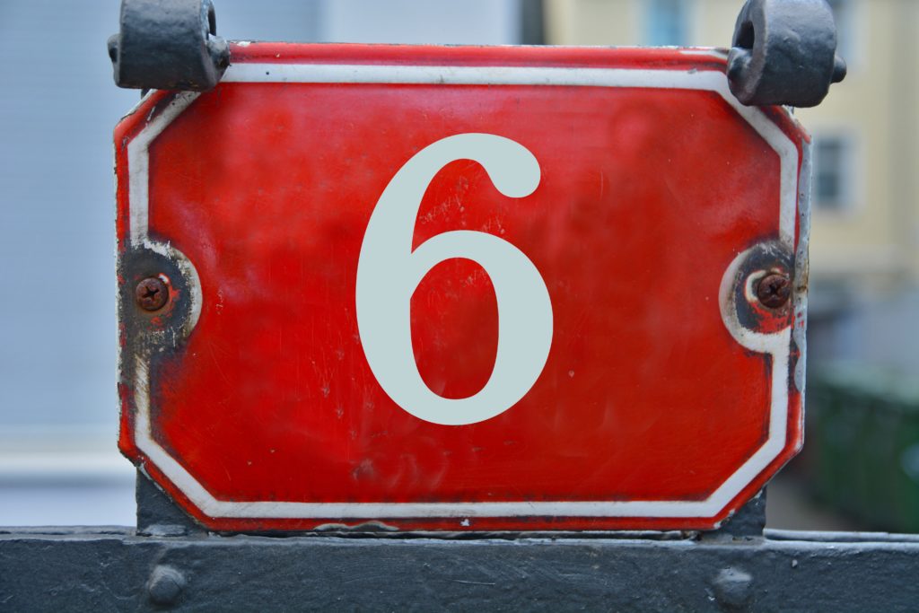 A,Red,House,Number,Plaque,,Showing,The,Number,Six,(6)