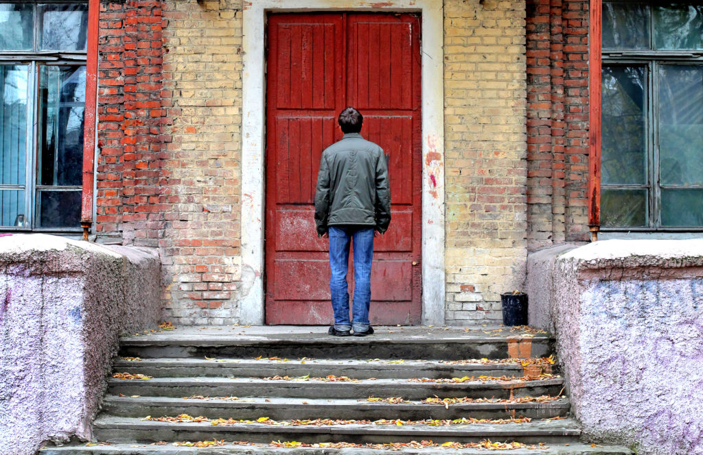 Man,In,Front,Of,The,Old,House,Before,The,Closed