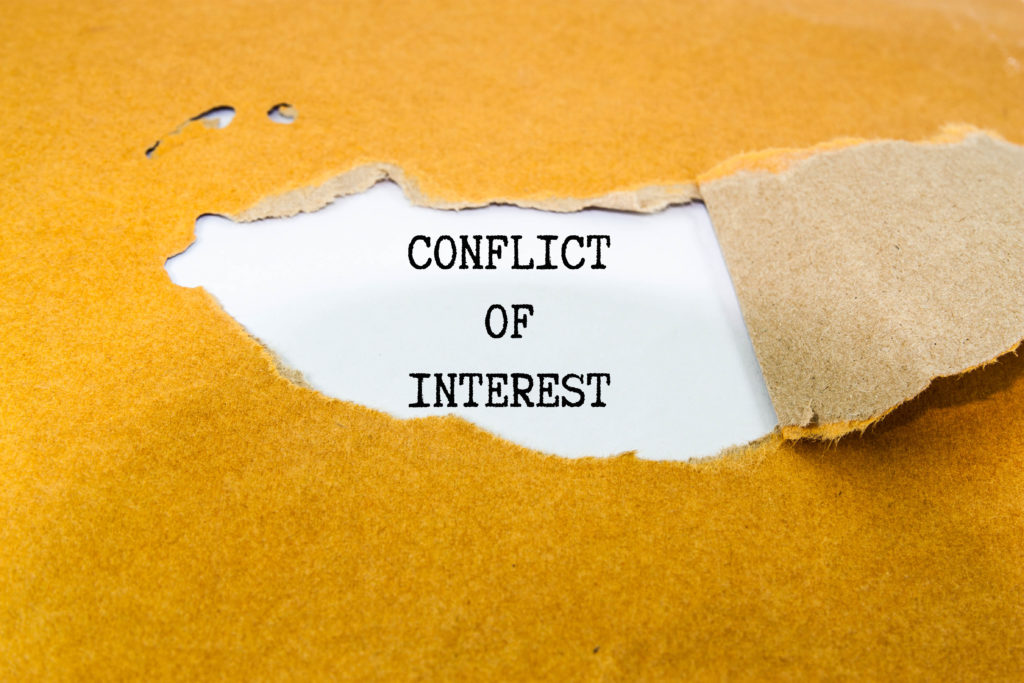 Conflict,Of,Interest,Text,On,Brown,Envelope