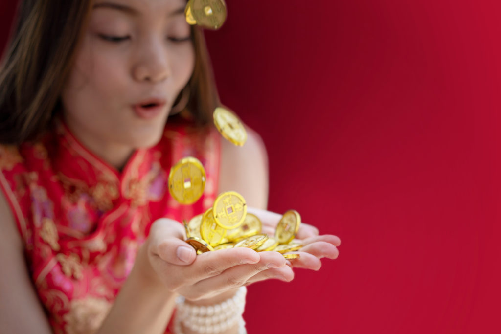 Young,Asian,Woman,Happy,To,Got,Coin,Of,Gold,Falling