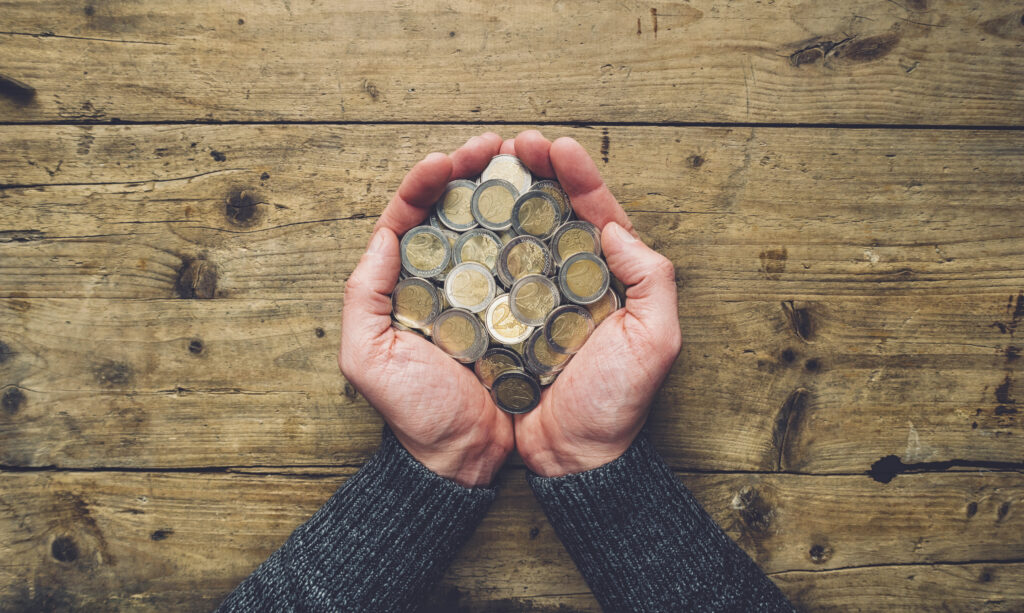 Man,Hands,Holding,A,Heap,Of,Euro,Coins,Banner,Background,