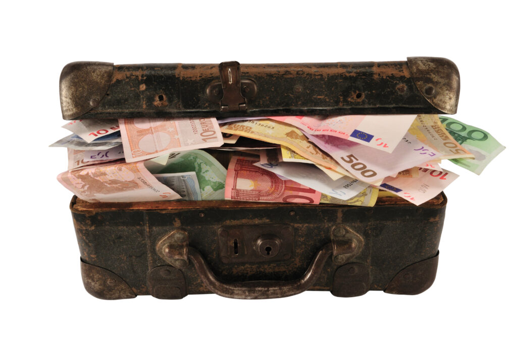 Old,Brown,Suitcase,With,Full,Of,Different,Money,,Isolated,On