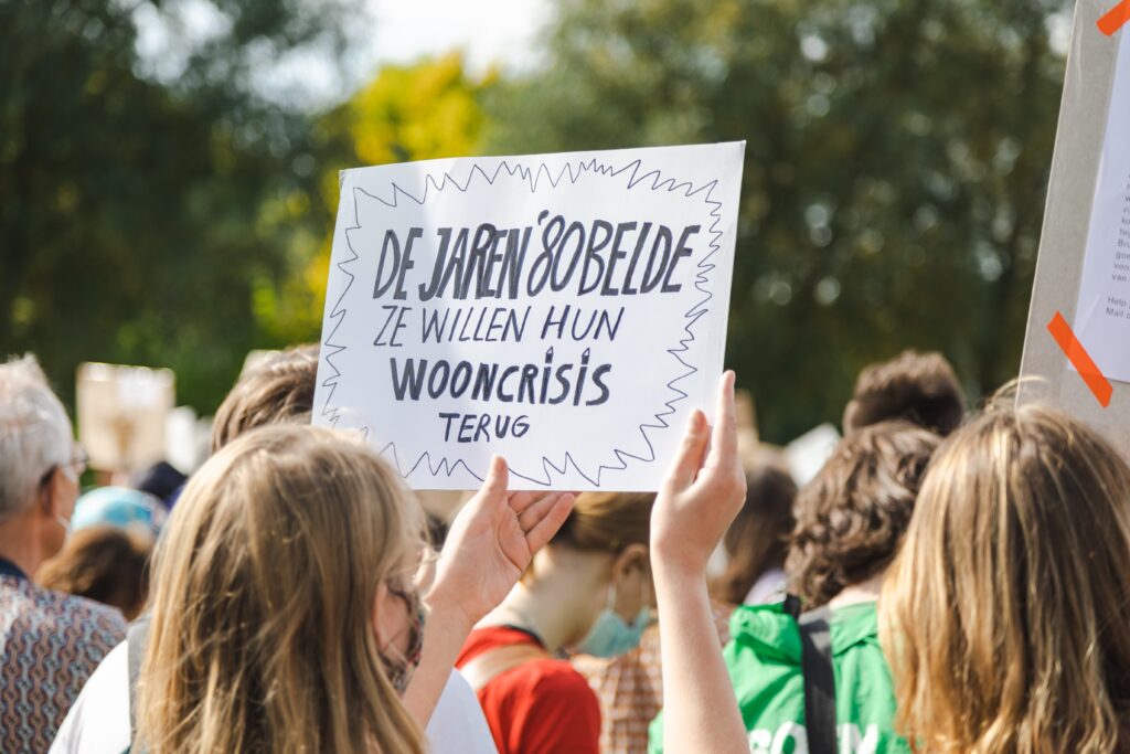 Amsterdamthe,Netherlands,,Sep,12,,2021:,People,Holding,Protest,Signs,During