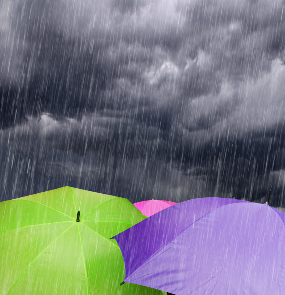 Color,Umbrellas,In,Rainy,Storm,Clouds