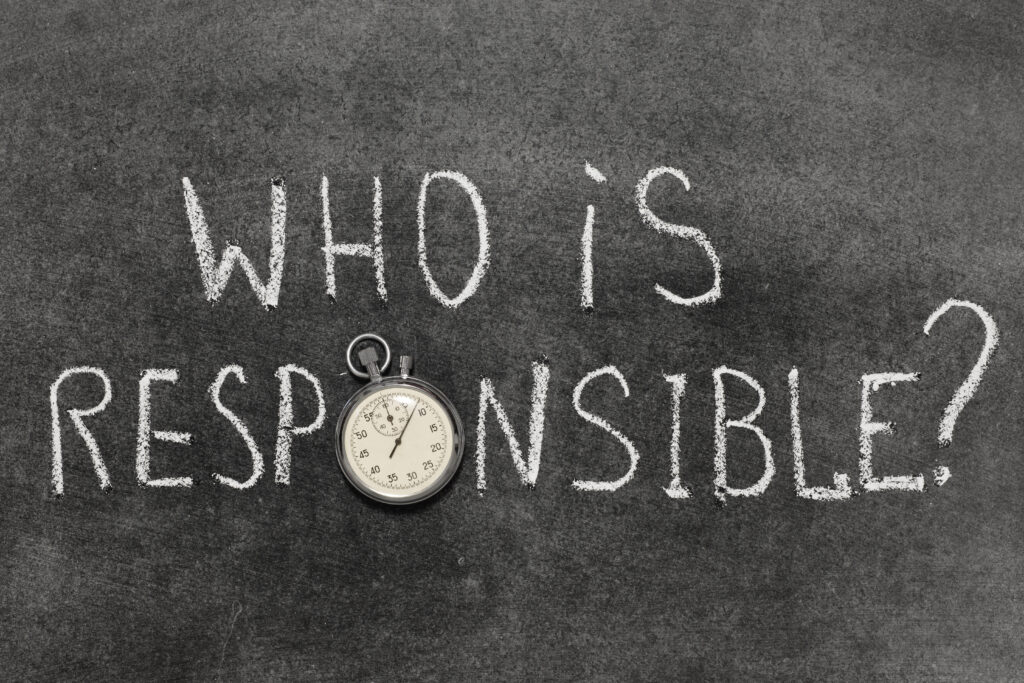 Who,Is,Responsible,Question,Handwritten,On,Chalkboard,With,Vintage,Precise