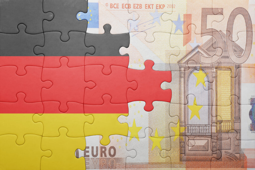 Puzzle,With,The,National,Flag,Of,Germany,And,Euro,Banknote