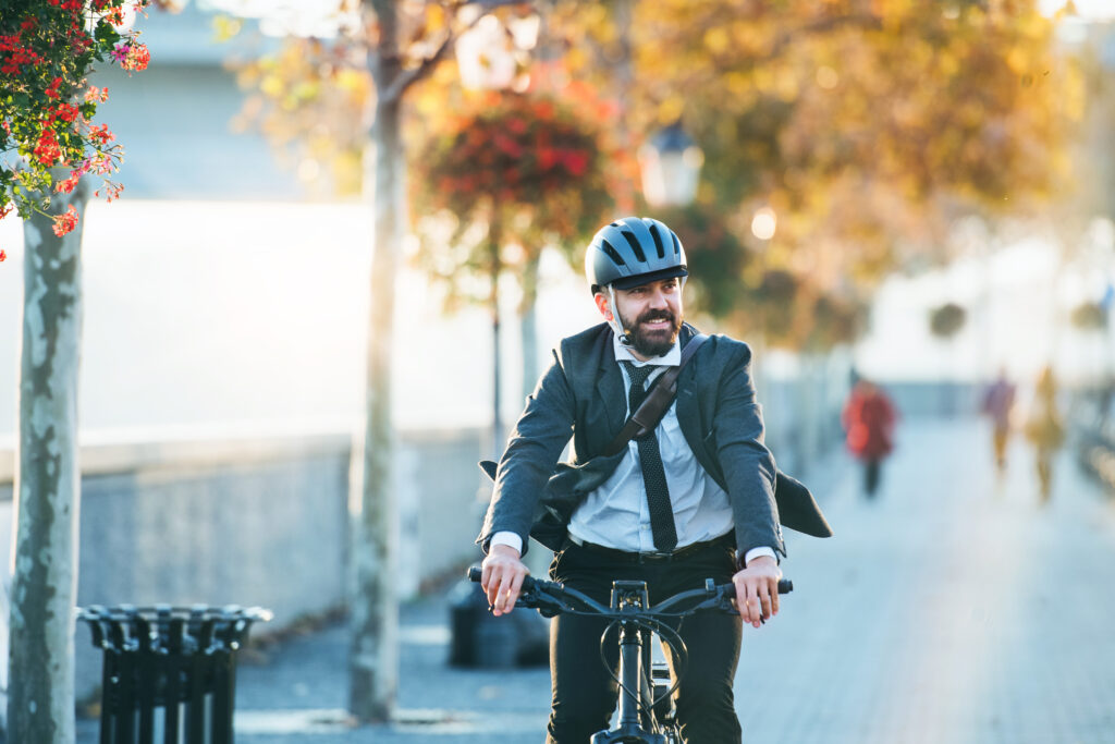 Hipster,Businessman,Commuter,With,Electric,Bicycle,Traveling,Home,From,Work