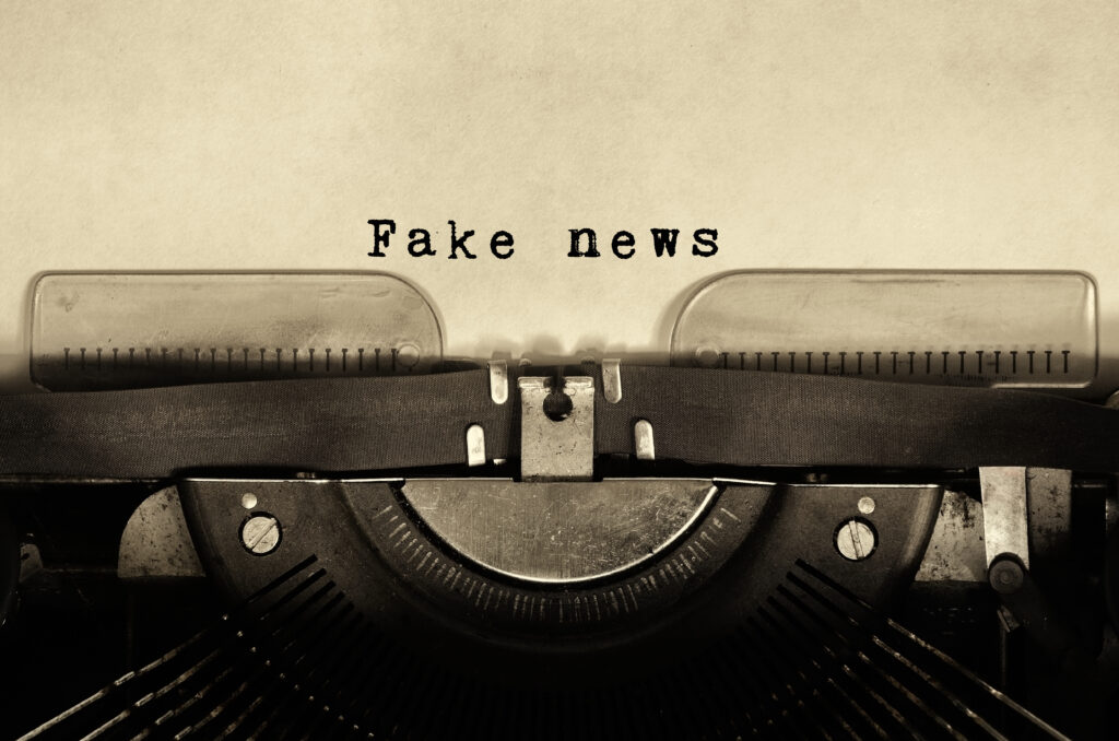 Fake,News,Words,Typed,On,Vintage,Typewriter.